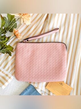 Patricia Nash woven leather wristlet.